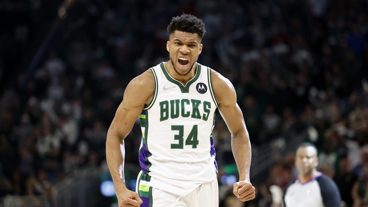 Giannis playing basketball for Milwaukee Bucks